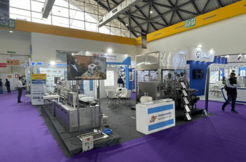 Exhibition booth with large branding display for HVAC solutions at Gartex Texprocess India 2025.