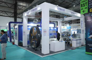 Booth featuring HVAC equipment with modern design and interactive displays at Automate Detroit 2025.