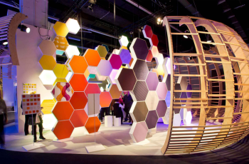 Custom exhibition booth design for Texworld Apparel Sourcing Paris 2025 featuring fashion fabric displays